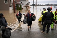 Torrential rains unleash widespread flooding, evacuations in Pacific Northwest