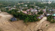 Indonesia floods and landslides kill over 1,000 as rescue efforts continue