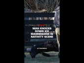 Man knocks down ICE mannequins in Nativity scene