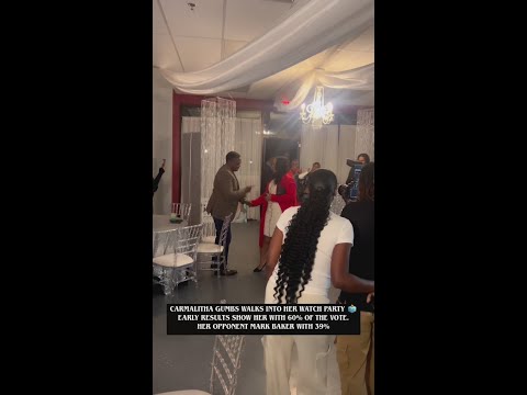 Caramalitha Gumbs walks into watch party on runoff election night