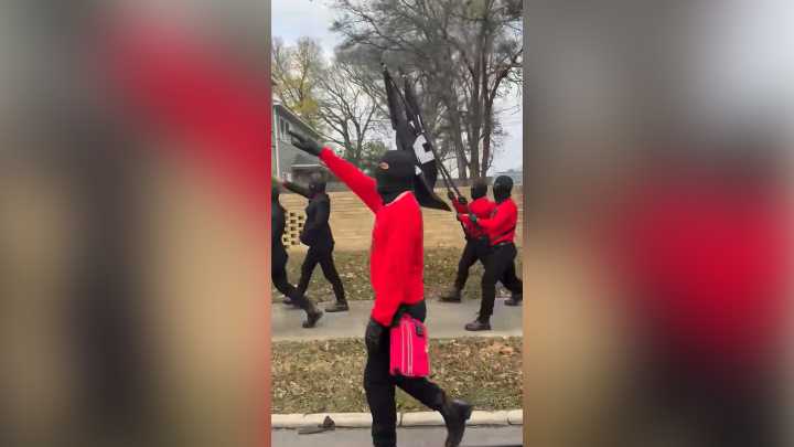 Masked neo-Nazis march through Arkansas community
