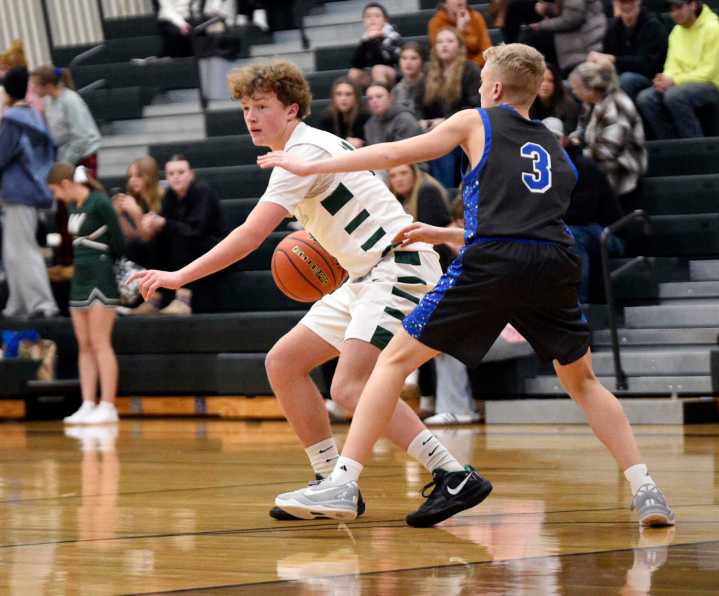 Boys basketball: Tanner Cusick, big third quarter spark Woodland past Mark Morris