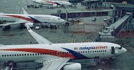 The 4 theories behind MH370 vanishing - including chilling 'ghost dive' 