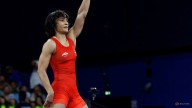 Wrestling-India's Phogat ends retirement for another crack at Olympic glory