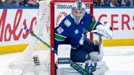 Canucks assign goalie Nikita Tolopilo, defenceman Elias Pettersson to AHL