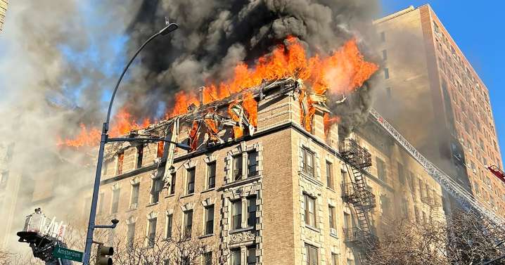 Fire rages at Upper West Side building, raining debris onto sidewalk