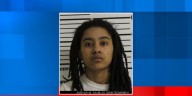 Davenport woman charged in drive