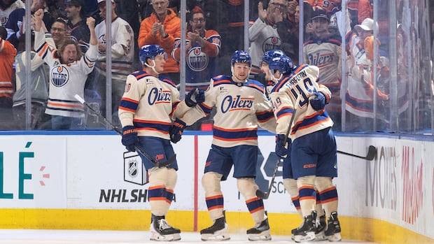 Oilers use 4-goal first period to clobber Jets 6