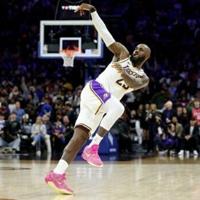 James and Doncic lead Lakers over Sixers, Thunder win 15th straight