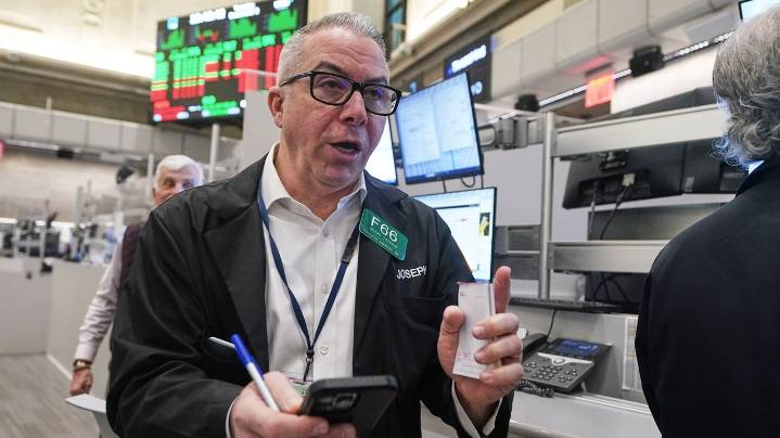 Wall Street rises to the edge of its all