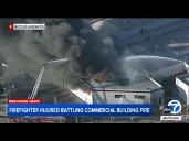 Firefighter injured while battling massive commercial building fire in Boyle Heights