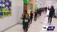 Ravens honor elementary school students for high attendance
