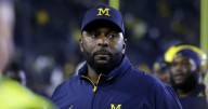 Michigan fires football coach for 'inappropriate relationship' with staff member