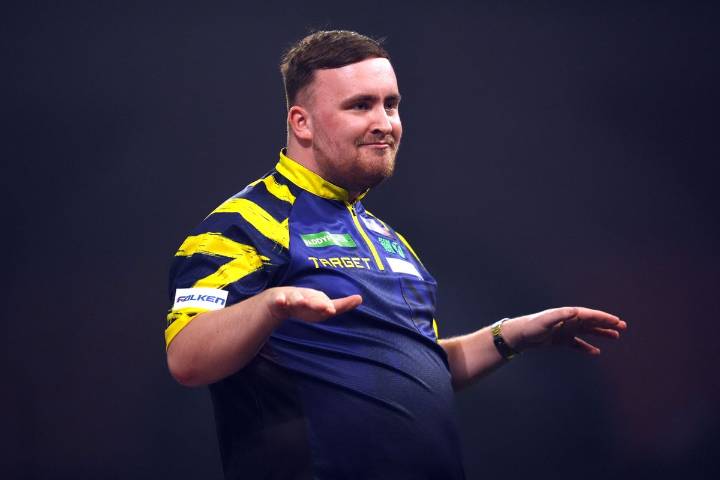 Luke Littler kicks off World Championship title defence with comfortable win