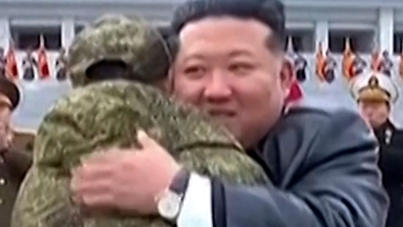 Kim Jong Un hugs troops back from Russia