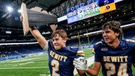 Traverse Moore's record finish powers DeWitt football to state title