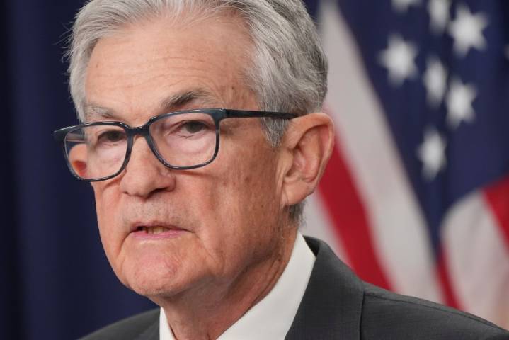 Federal Reserve cuts key rate, sees healthier economy next year