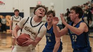 Travis Satterla helps Haslett basketball pull away from Ionia