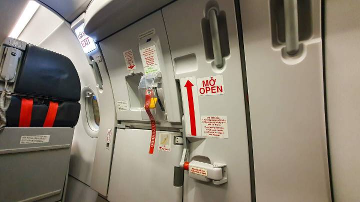 Passenger Arrested For Trying To Open Plane Door Mid Flight