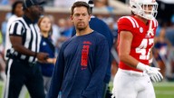 Charlie Weis returns saves Ole Miss as it fights with Lane Kiffin