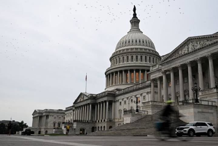 US House backs massive defense policy bill, Senate next