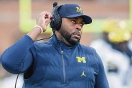 Michigan football coach detained after being fired