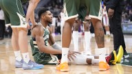 'It doesn't look good': Giannis Antetokounmpo leaves game with scary non
