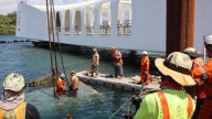 150 tons of concrete lifted off of USS Arizona at Pearl Harbor