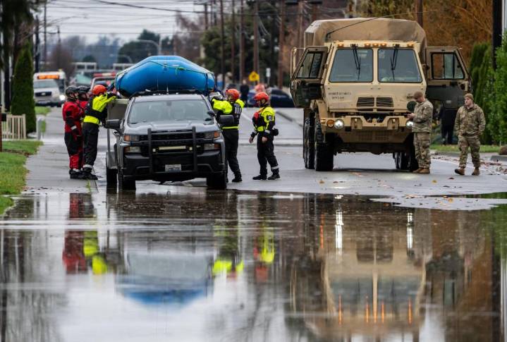 Arctic air sweeps south as residents of the Pacific Northwest remain on guard after severe flooding