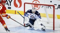 Jets’ Connor Hellebuyck nears return following knee surgery