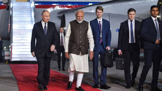 Vladimir Putin in India; Narendra Modi breaks protocol, arrives at airport to receive Russian President