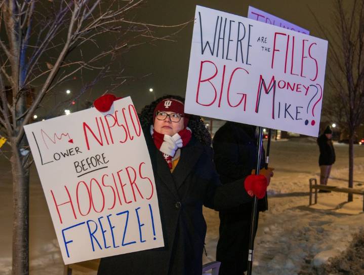 Protestors criticize Braun's redistricting plan outside Hammond fundraiser