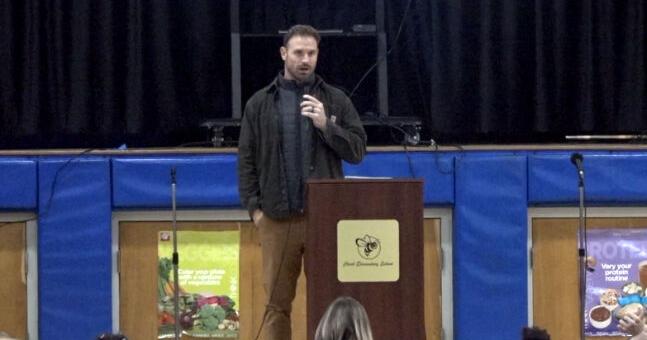 Chris Long visits students as part of Edzone literacy program