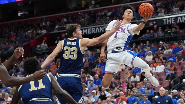 Xaivian Lee scores 24 to lead No. 18 Florida to an 80-70 victory over George Washington