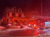 Wood stove ashes improperly disposed cause Syracuse house fire, 2 residents displaced