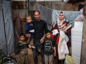 From war to winter: Gaza couple wait to welcome baby in flooded tent