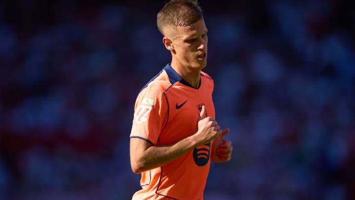 Barcelona's Dani Olmo out 1 month after dislocating shoulder