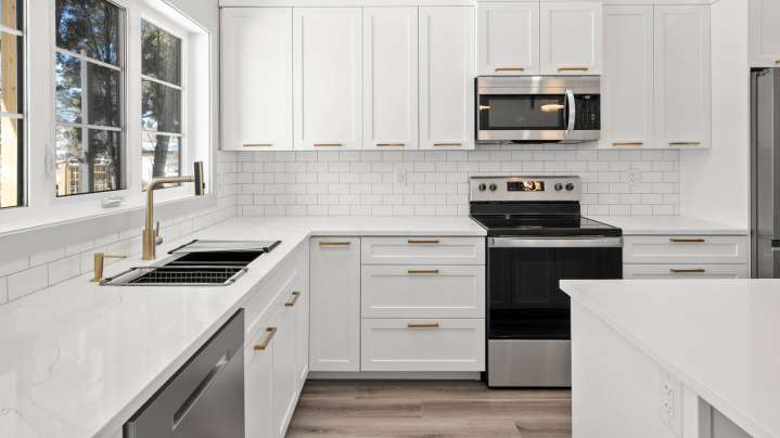 X Touch-Free Kitchen Tools And Features To Consider Adding To Your Space