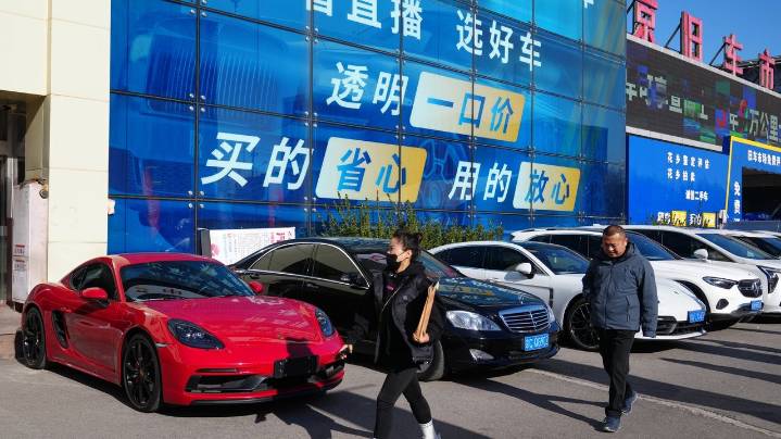 High-end car sales sink in China as its economy slows, taking a toll on European automakers