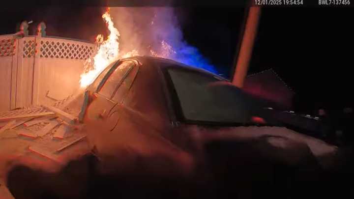 Watch: Neb. officers break window, rescue unconscious DUI suspect from burning car