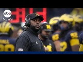Fired University of Michigan football coach charged with home invasion, stalking