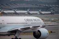 Cathay Pacific passenger arrested after attempting to open door midflight between Boston and Hong Kong