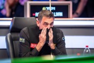 Ronnie O’Sullivan suffers shock first-round defeat to Zhou Yuelong in UK Championship