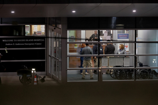 Photos show police investigation of a shooting at Brown University.