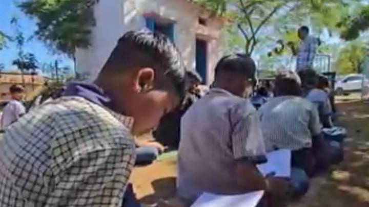 Unsafe school building pushes children to attend classes under open sky in MP