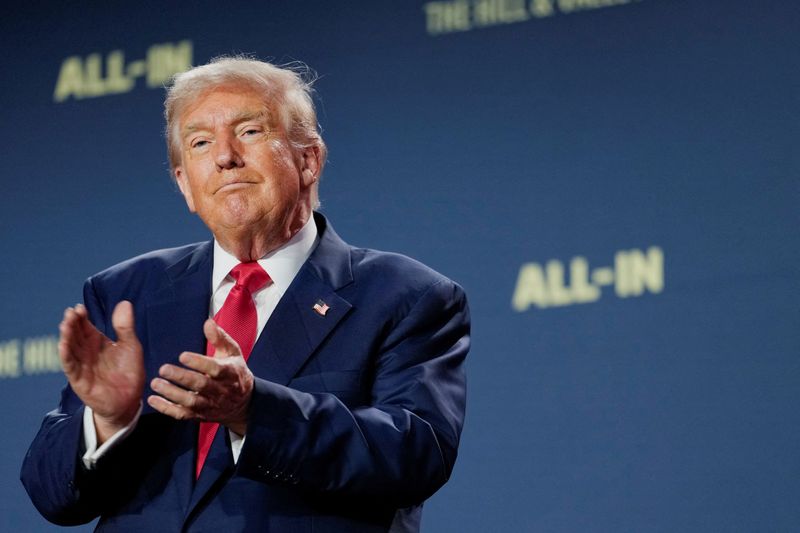 Trump says he will sign order curbing state AI laws