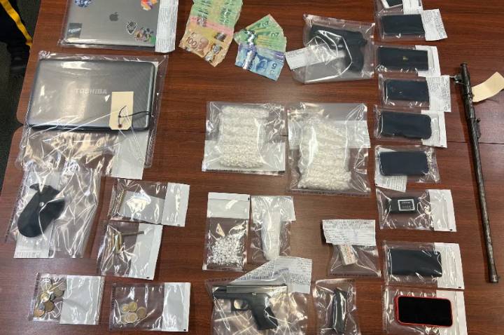 Two Calgary men facing charges after search finds drugs and firearms