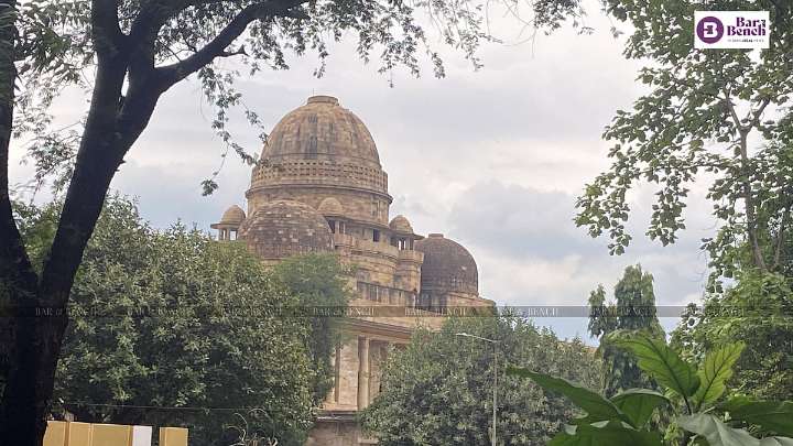 Holding minor’s hand and offering money with sexual intent amounts to sexual assault under POCSO: Bombay HC