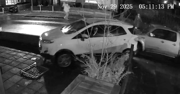 Moment pickup truck smashes into car as terrified residents flee