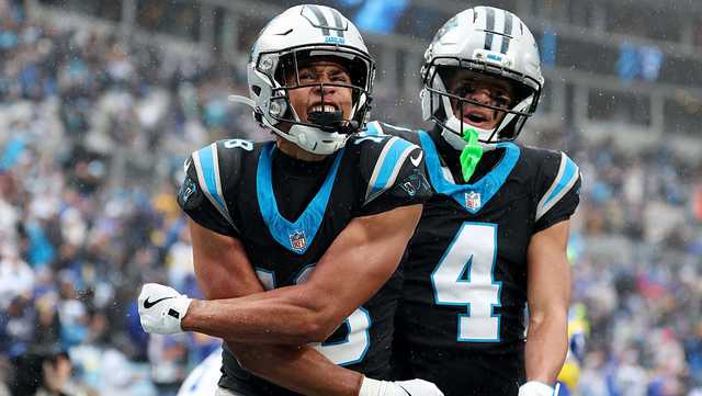 Young throws 3 TDs, Panthers top Rams 31